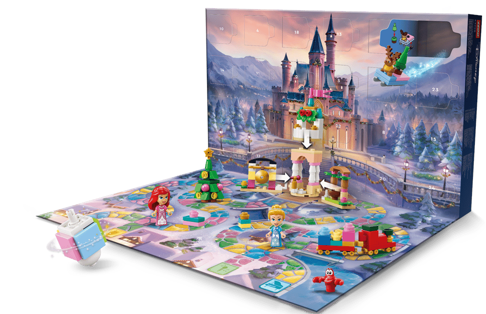 Ein LEGO Adventskalender mit einer Burg, Figuren und Weihnachtsdeko.