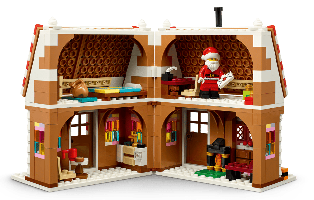 Zweistöckiges Lego-Haus mit Weihnachtsmann, Bett, Küche und Kamin.