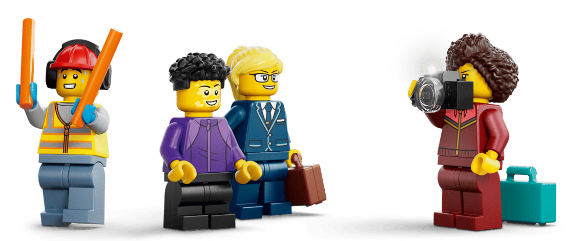 Lego-Figuren: ein Lotsenhelfer, zwei Geschäftsleute, ein Fotograf.