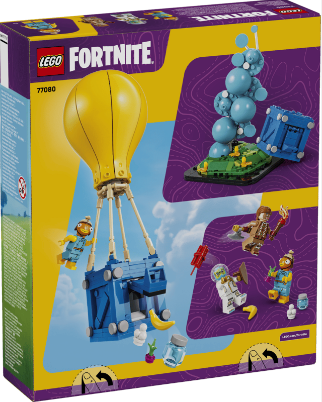 Lego Fortnite Box: Gelber Ballon, blaue Truhe, Figuren und Landschaft.
