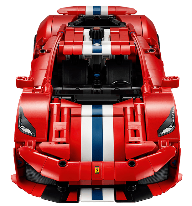 Ein rotes Lego-Technic-Ferrari-Modellauto mit weißen und blauen Streifen von oben.
