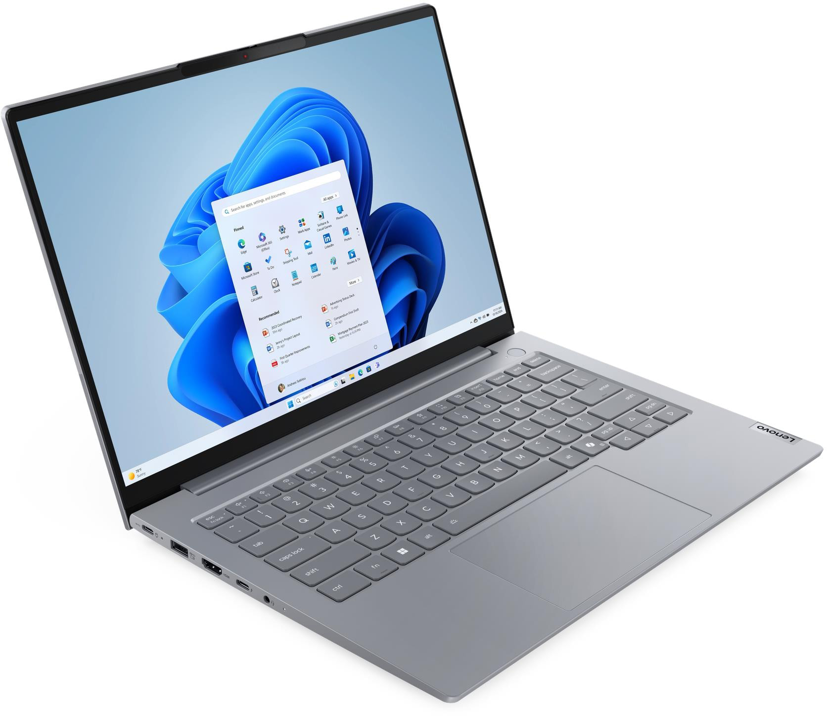 Szürke Lenovo laptop Windows 11 Start menüvel a képernyőn.