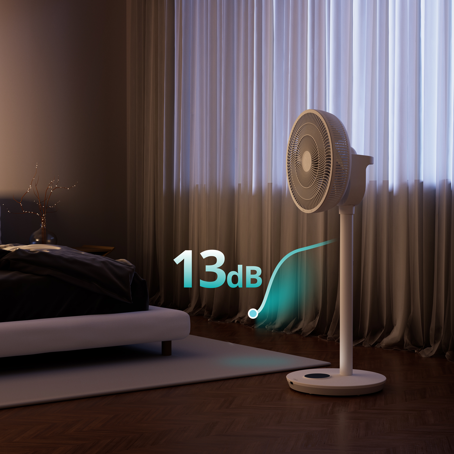 A white fan stands in a bedroom next to a bed and curtains. 13dB shown.