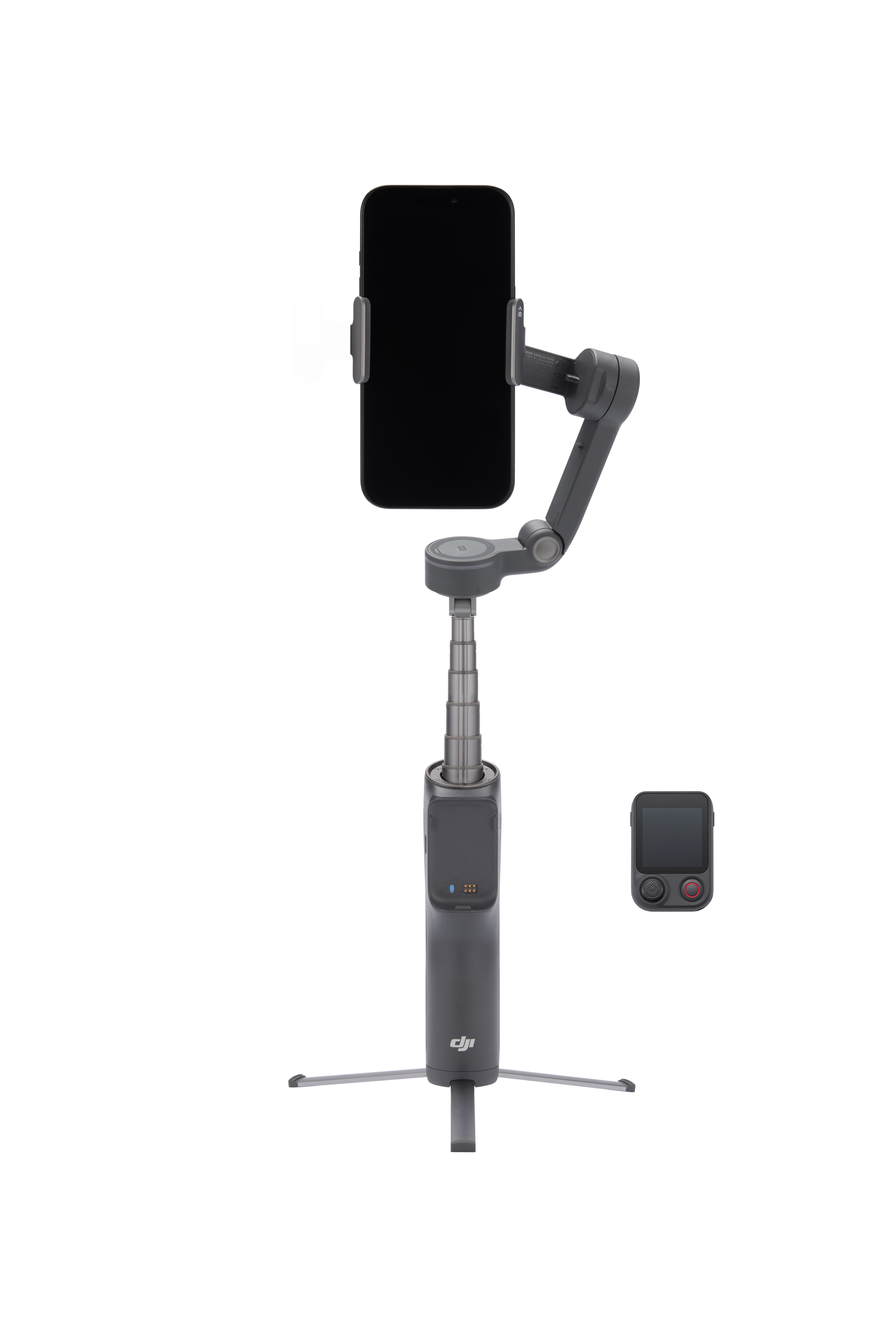 Szürke gimbal telefonnal, állvánnyal és távirányítóval fehér háttéren.