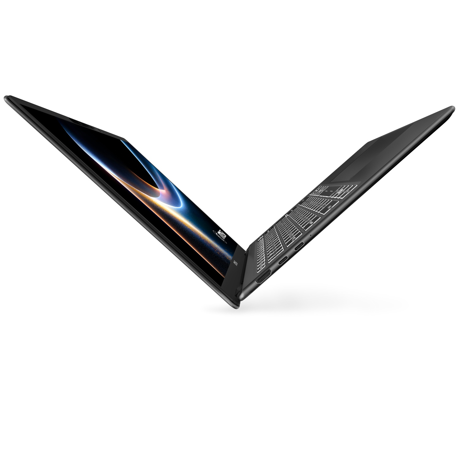 A black laptop is open, showing a colorful abstract wallpaper on its screen.