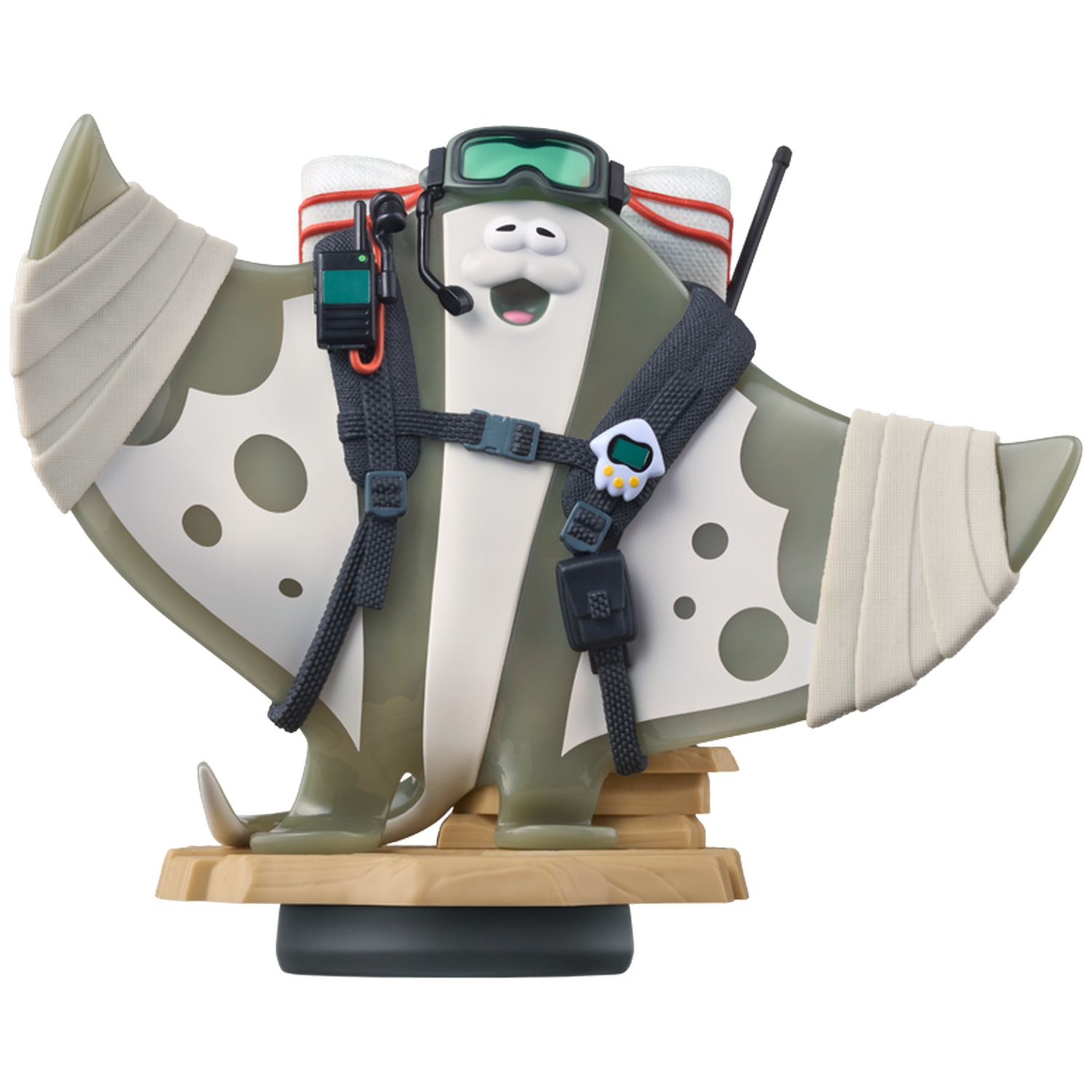 A gray manta ray figure with goggles and radio wears bandages.
