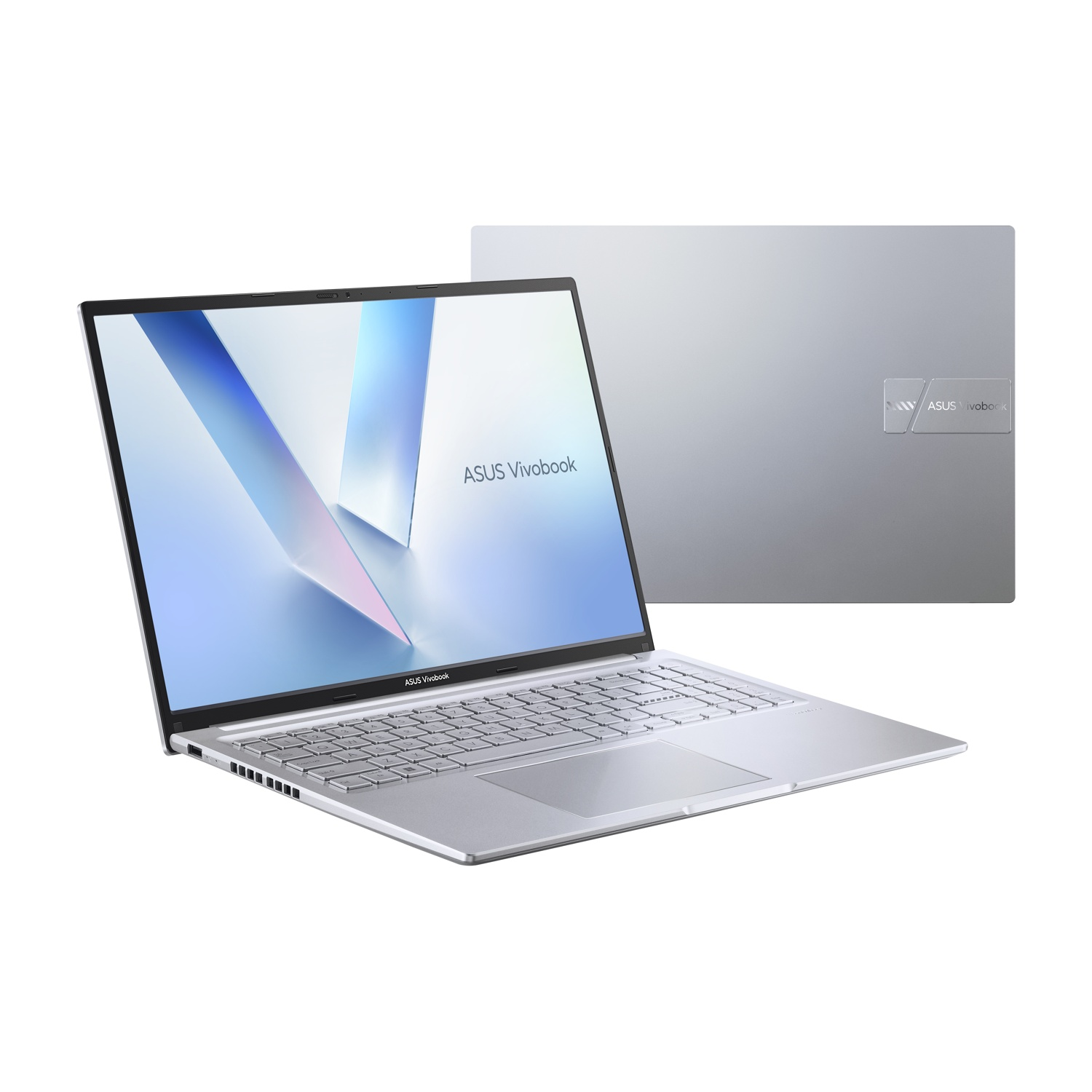 Un laptop Asus Vivobook argentato con schermo aperto, che mostra la tastiera.