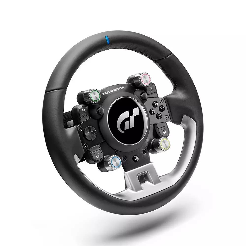 Un volante de carreras negro con detalles plateados y muchos botones.