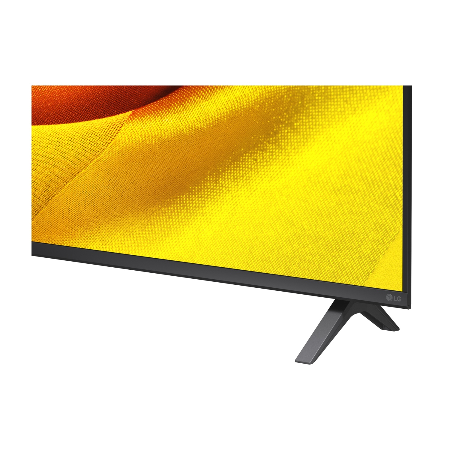 Un televisore LG con piedistallo, su sfondo di tessuto giallo e arancione.