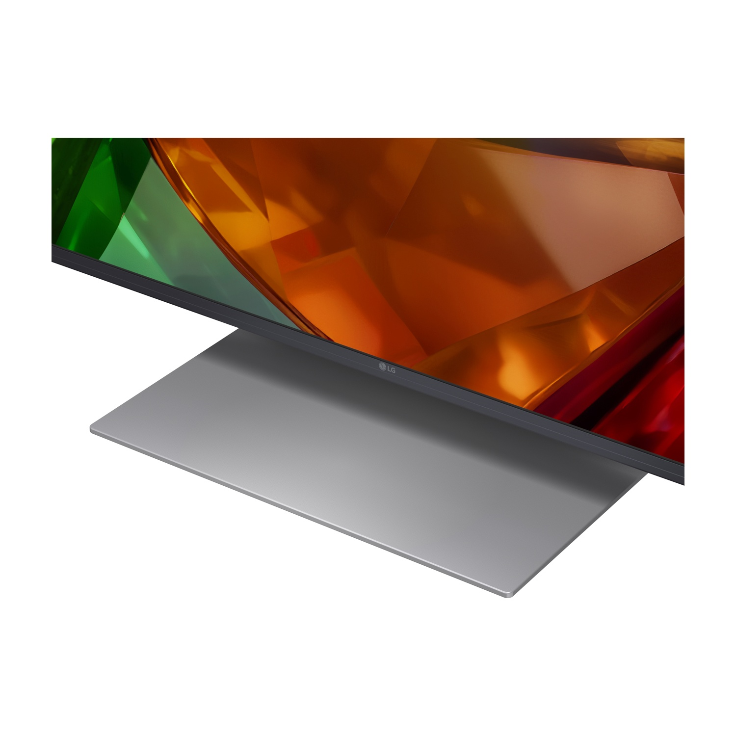 TV LG con supporto moderno e sfondo astratto verde e arancione.