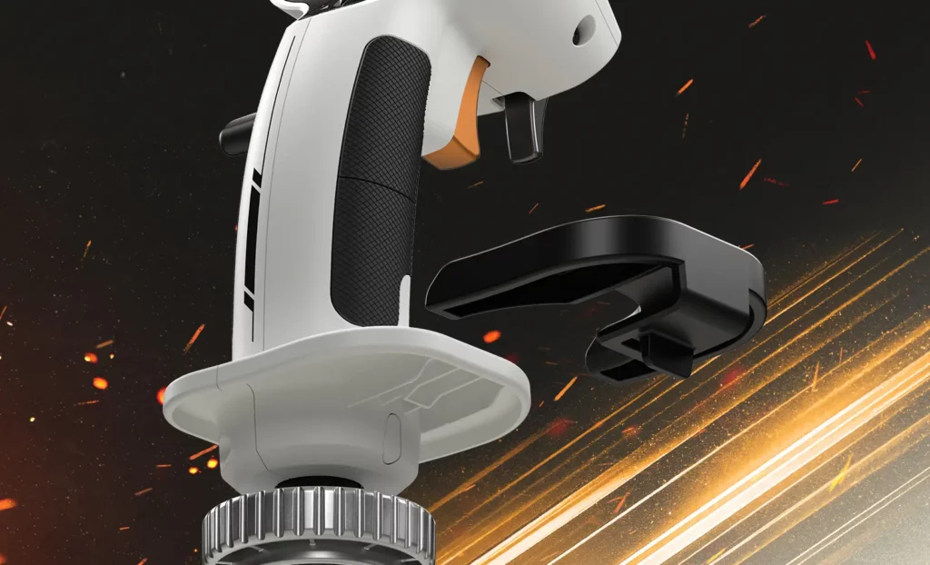 Un joystick blanco con detalles negros sobre fondo oscuro con chispas naranjas.