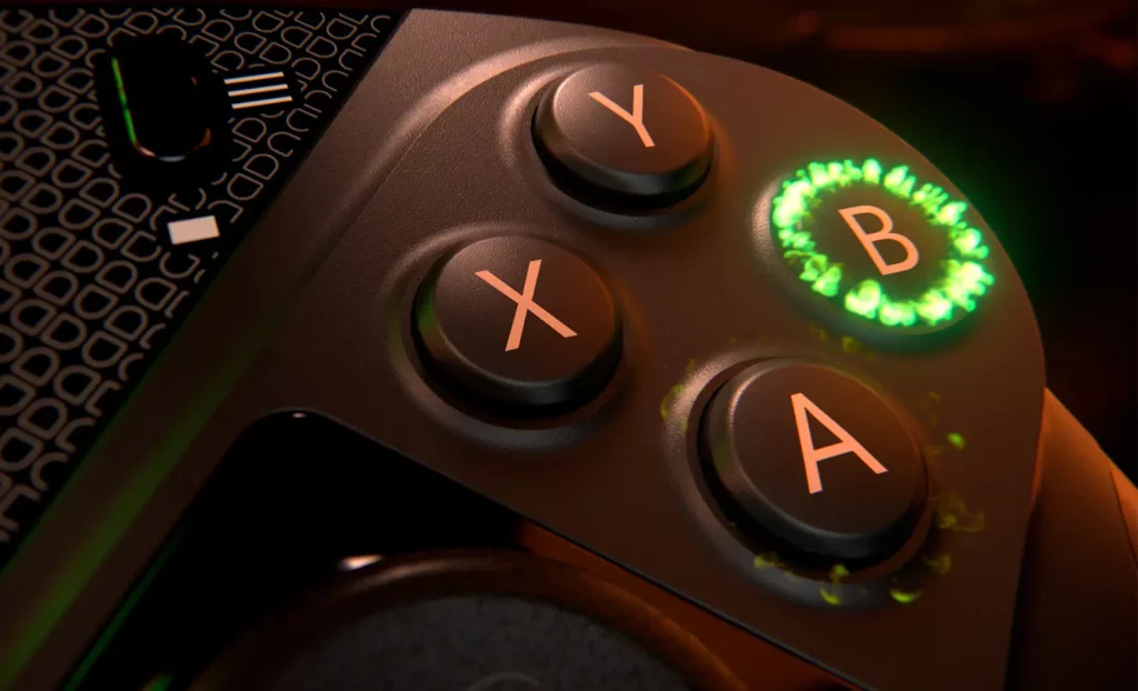 Un controlador oscuro con botones A, B, X, Y iluminados y una sección estampada a la izquierda.