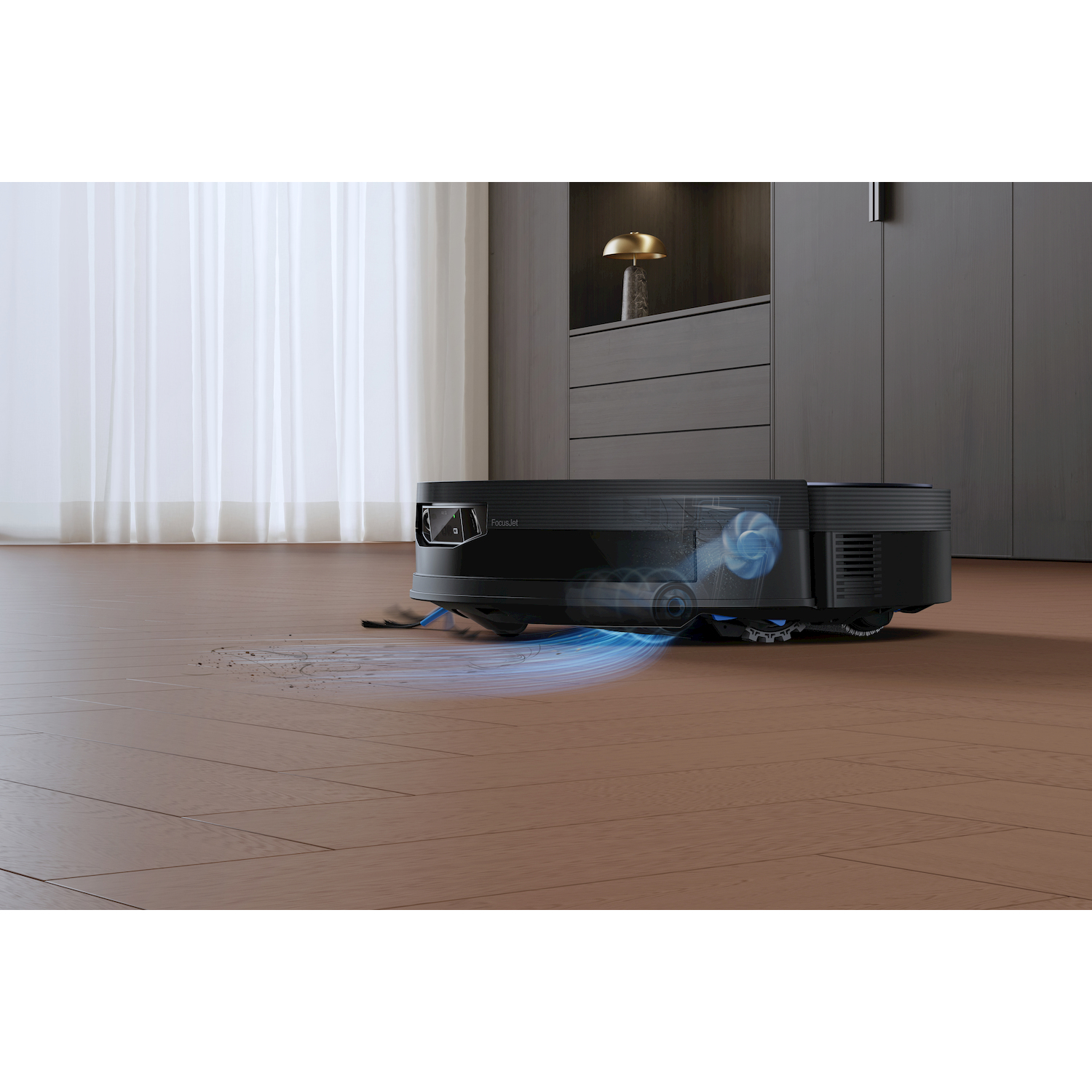Un robot aspirapolvere nero pulisce un pavimento in legno con effetto luce blu.