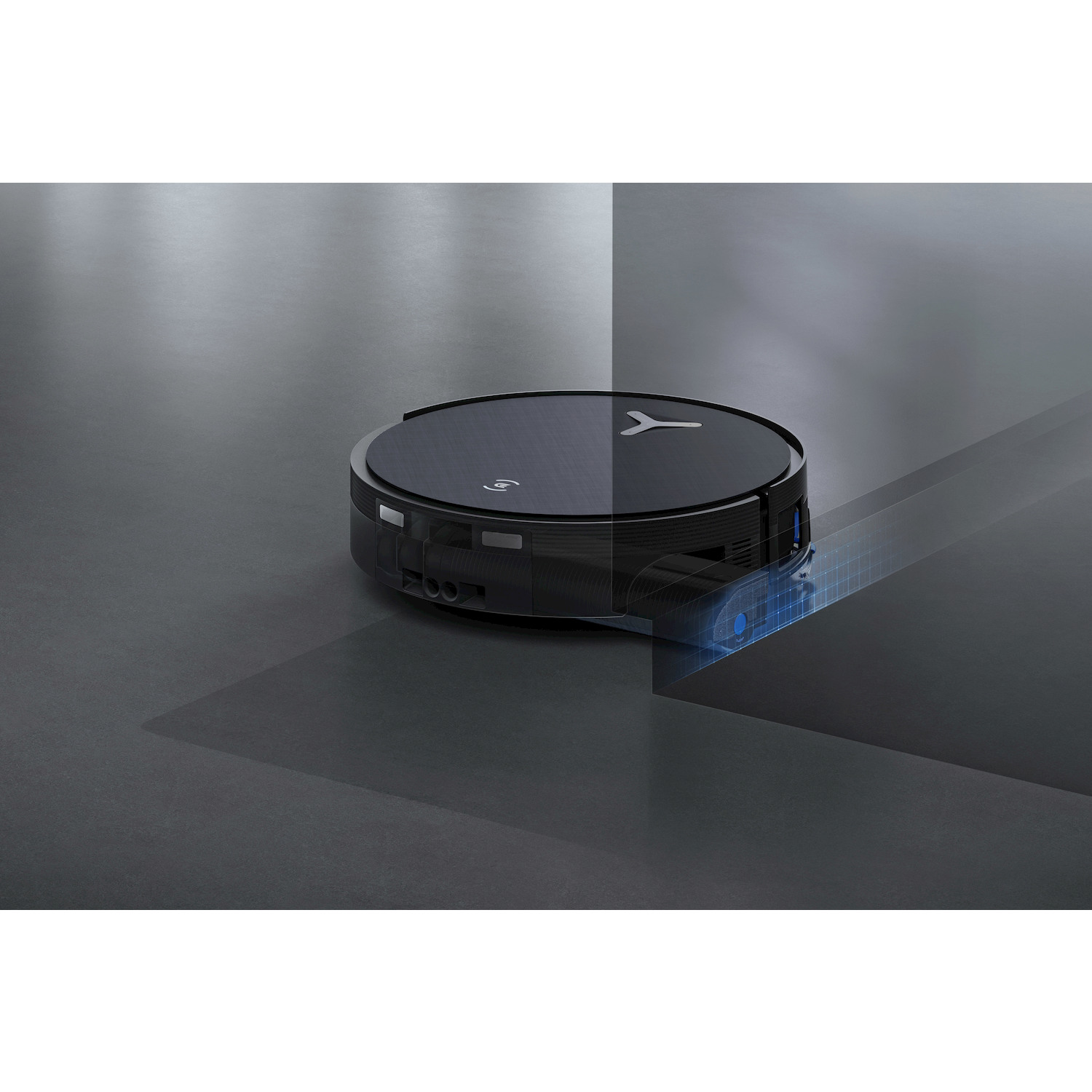 Un robot aspirapolvere nero pulisce un pavimento scuro, visualizzato da linee a griglia blu.