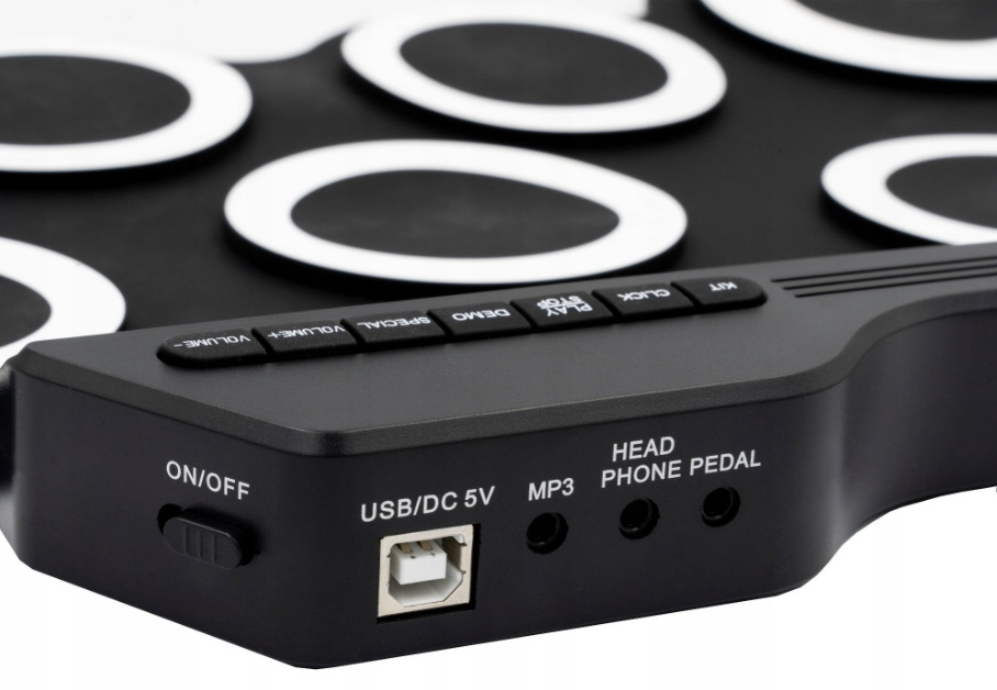 Elektroniczna podkładka perkusyjna z przyciskami sterowania, portem USB i gniazdem słuchawkowym.