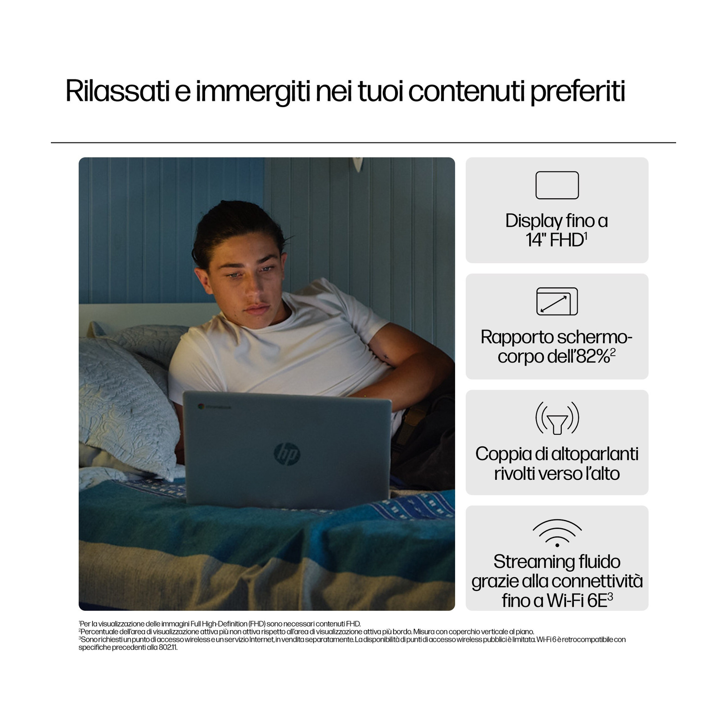 Un giovane uomo è a letto con un laptop. Lo schermo è illuminato.