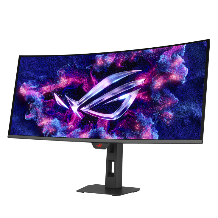Ívelt gamer monitor fényes ROG logóval, lila-kék háttér előtt.
