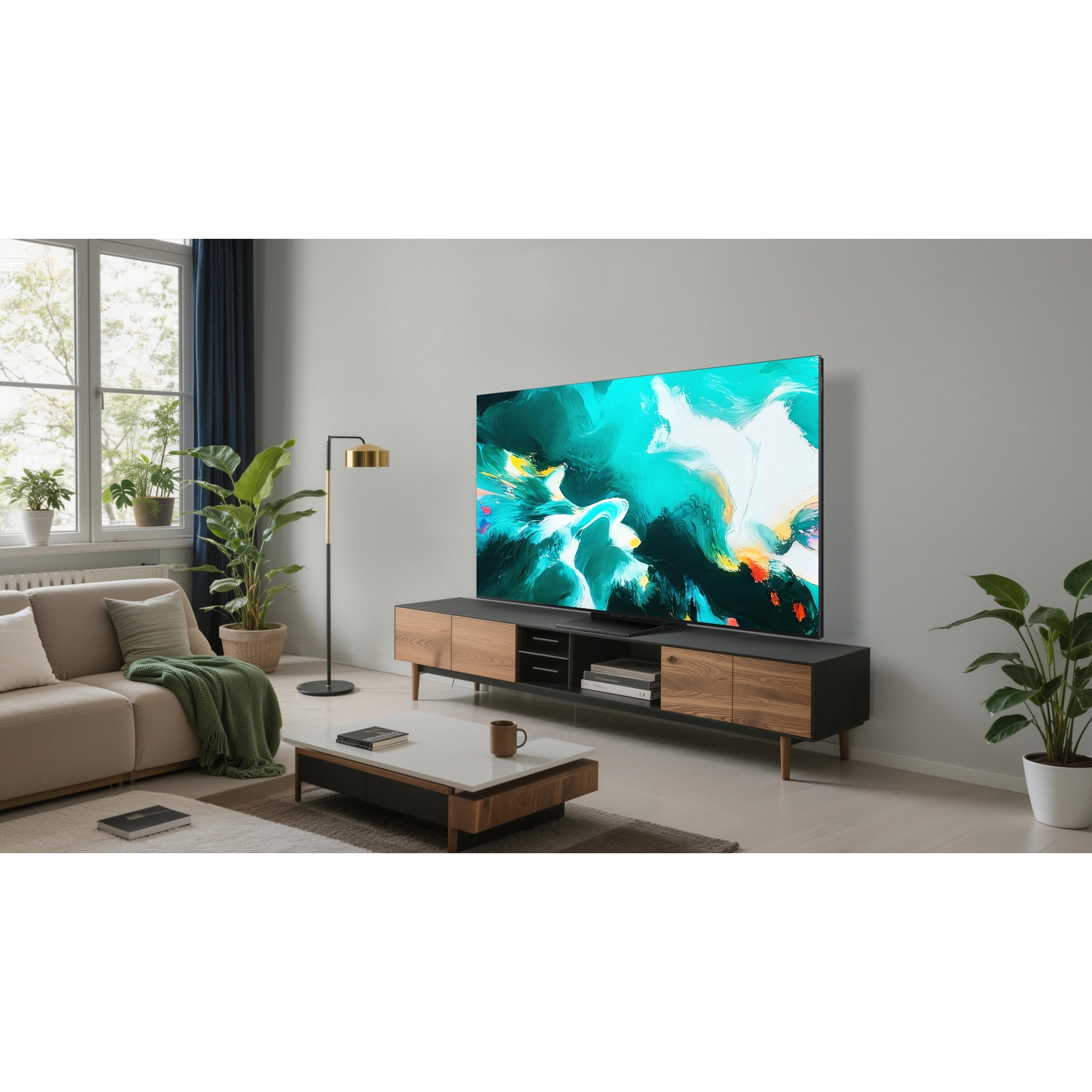 Salon moderne avec grande télévision, canapé beige et table basse.