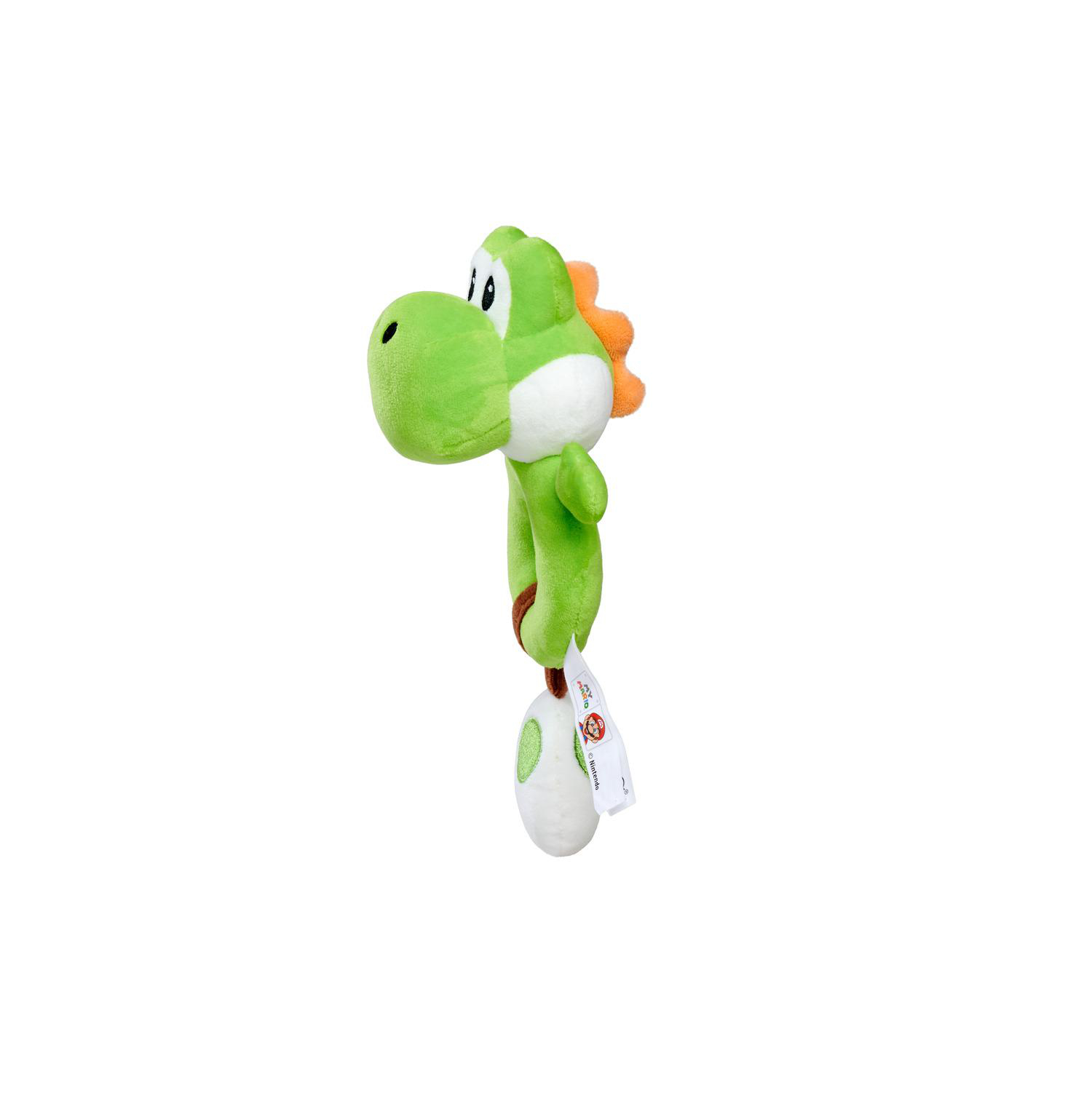 Eine grüne Yoshi-Plüschfigur mit oranger Mähne hält ein Ei.