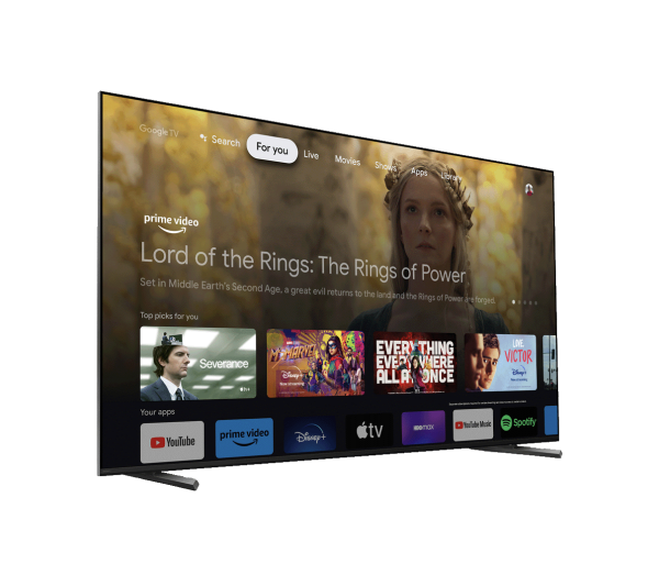 Nowoczesny telewizor wyświetla interfejs Google TV z filmem „Władca Pierścieni”.