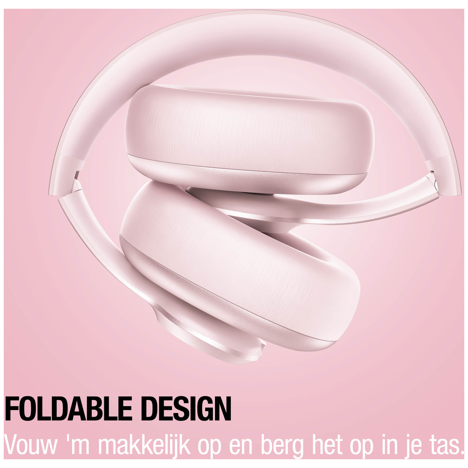 Een roze opvouwbare koptelefoon op een roze achtergrond.