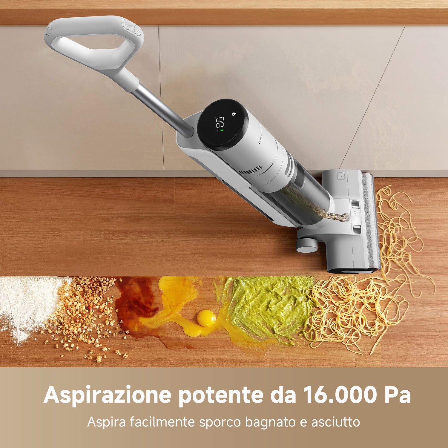 Un aspirapolvere senza fili aspira un misto di pasta, tuorlo d'uovo e piselli.