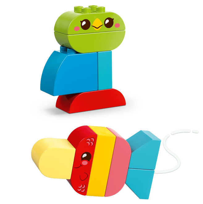 Zwei bunte LEGO-Figuren: eine grüne Vogelfigur und ein Fisch mit gelbem Schnabel.