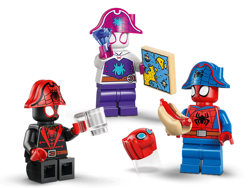 Drei Lego-Figuren im Piraten-Stil: eine mit Karte, eine mit Hotdog, eine mit Becher.