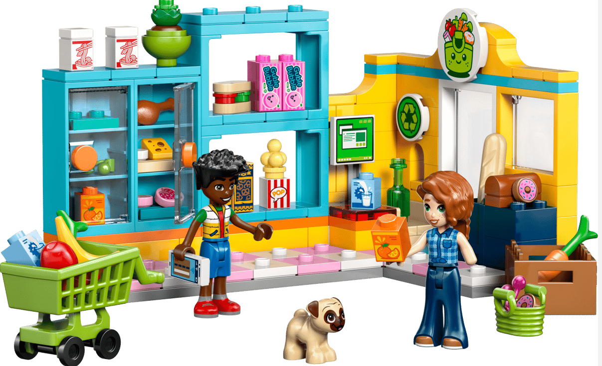 Lego-Figuren in einem Lebensmittelladen mit Einkaufswagen, Mops und Lebensmitteln.