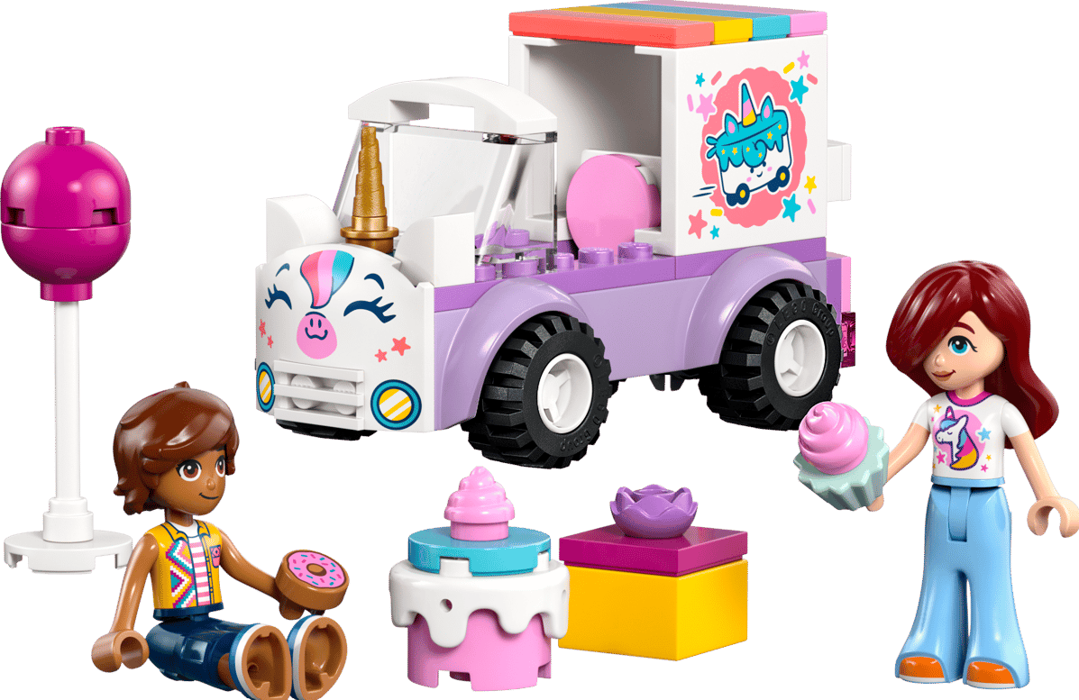 Ein lila Eiswagen mit Einhorn-Design, zwei Figuren, ein Donut, ein Kuchen und ein großer lila Lutscher.