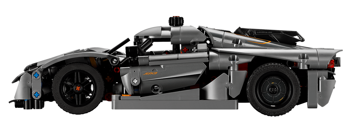 Graues Lego-Technic-Supersportwagenmodell mit orangen Akzenten, Seitenansicht.