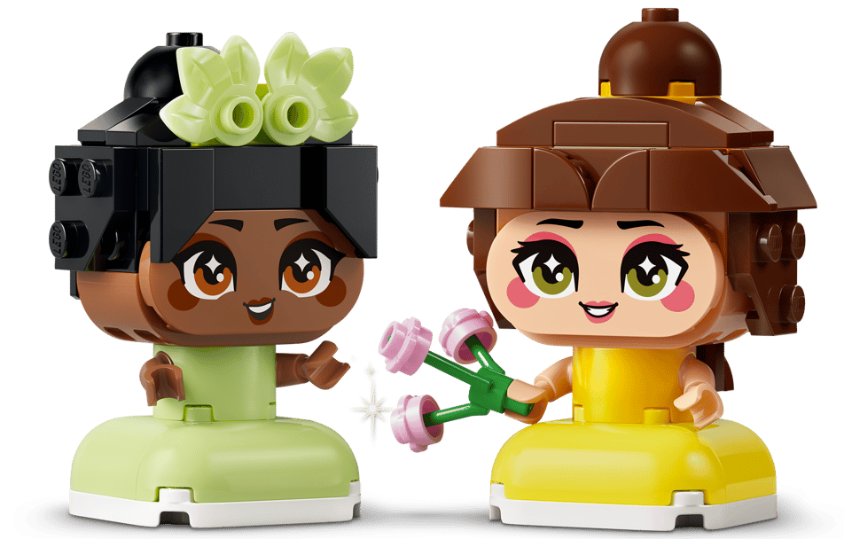 Zwei Lego-Figuren: Links ein Mädchen in Grün mit Blumen im Haar, rechts ein Mädchen in Gelb mit Blumenstrauß.