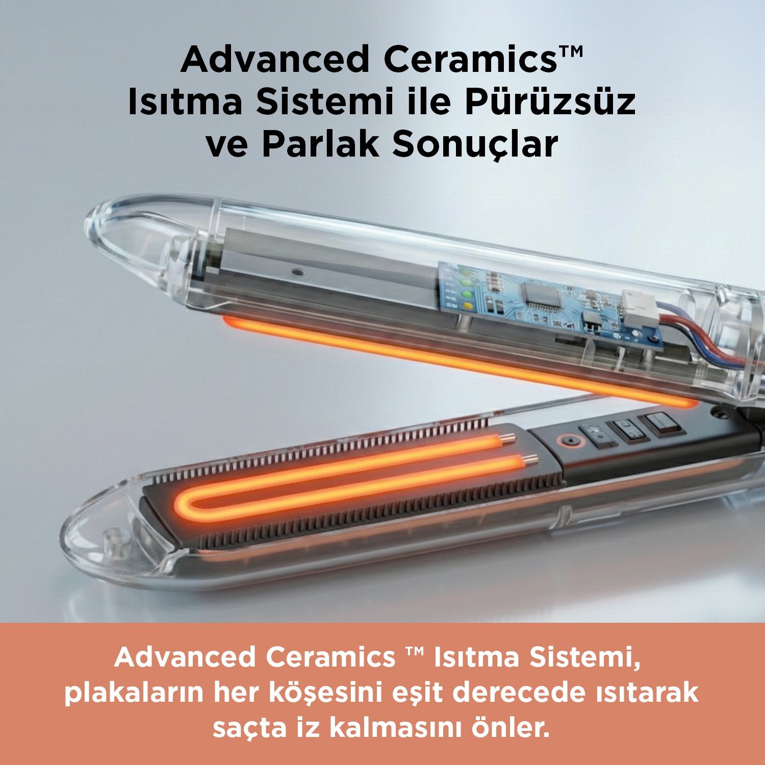 Açık bir saç düzleştirici, ısıtma plakalarını ve iç elektroniğini gösterir.