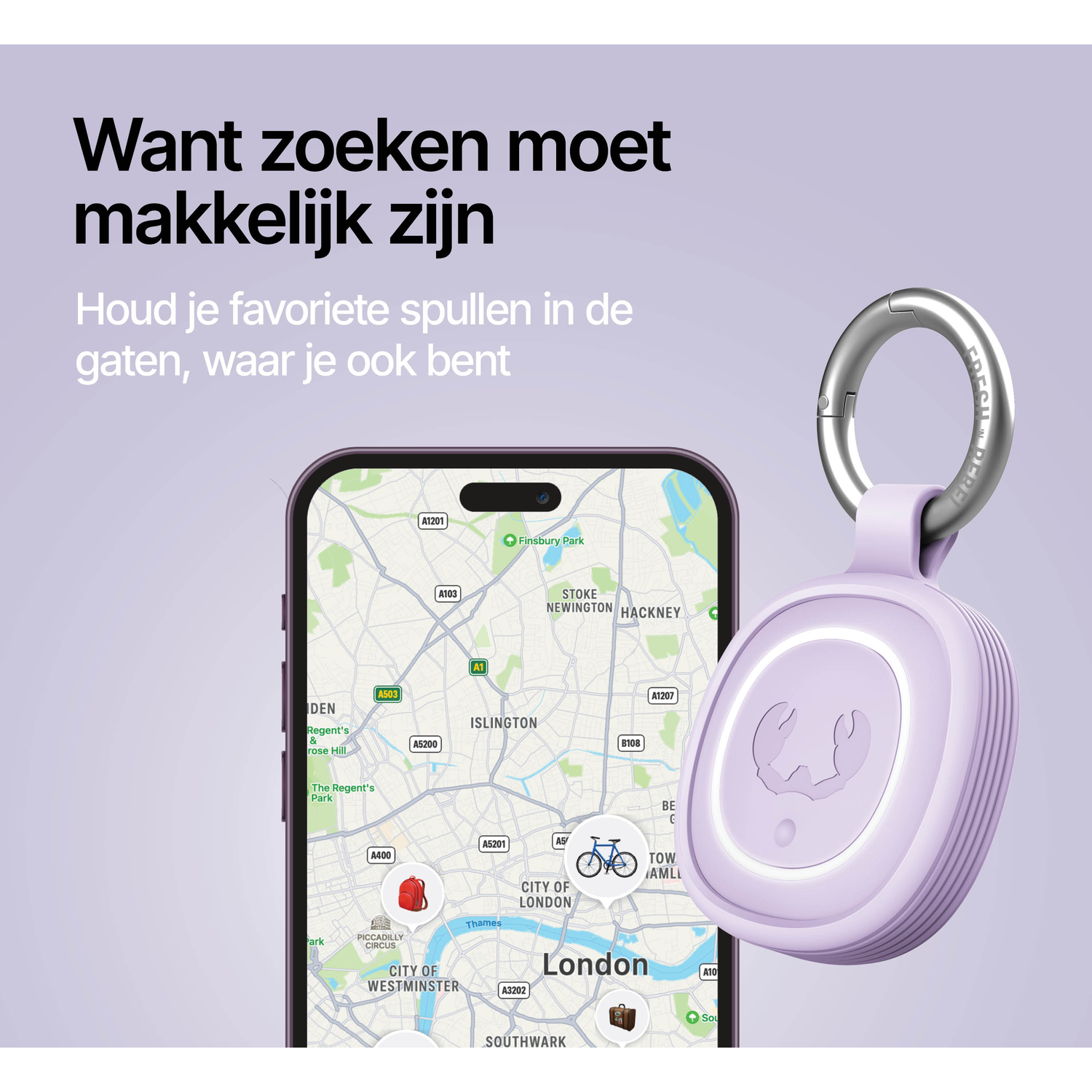 A purple tracker with a keyring next to a smartphone displaying a map of London.