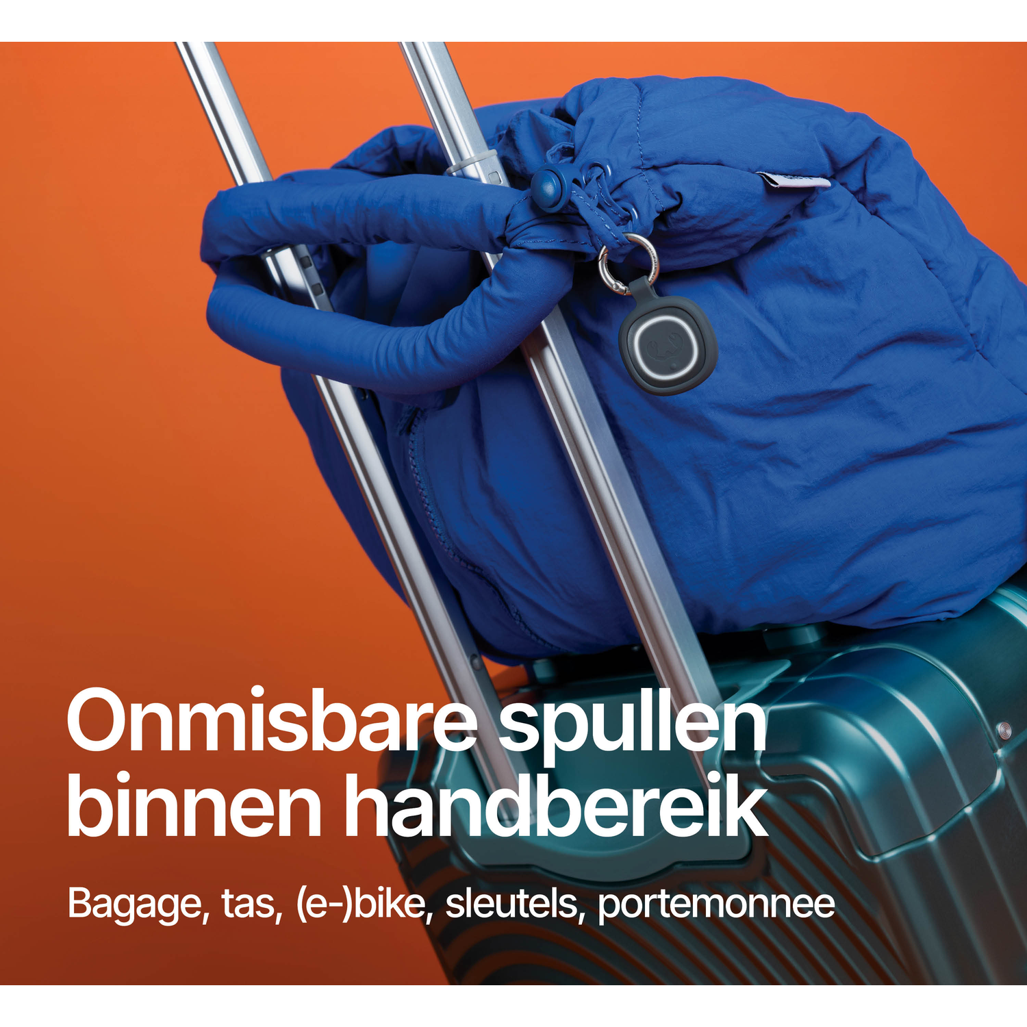 A blue bag attached to a suitcase handle against an orange background.