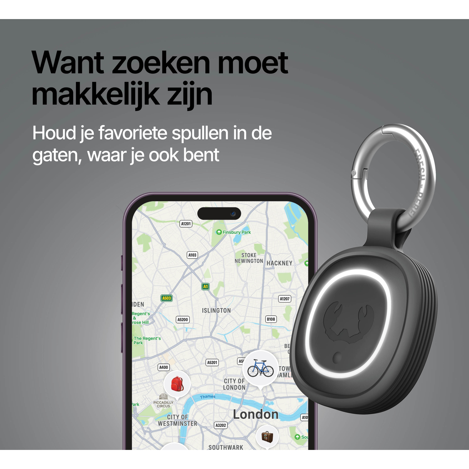 A black tracker with a light ring hangs next to a smartphone displaying a map of London.
