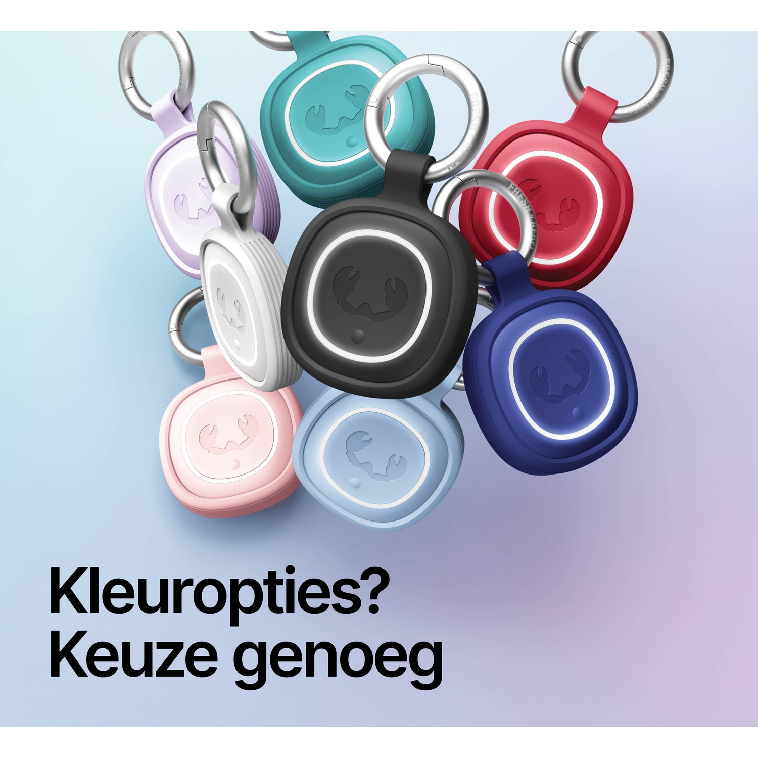 A group of colorful keychains with carabiner clips hanging side-by-side.