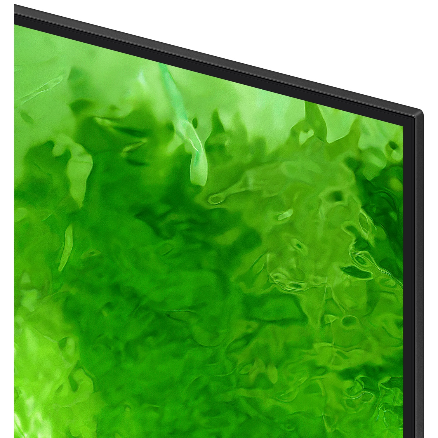 Close-up of a TV screen displaying vibrant green.