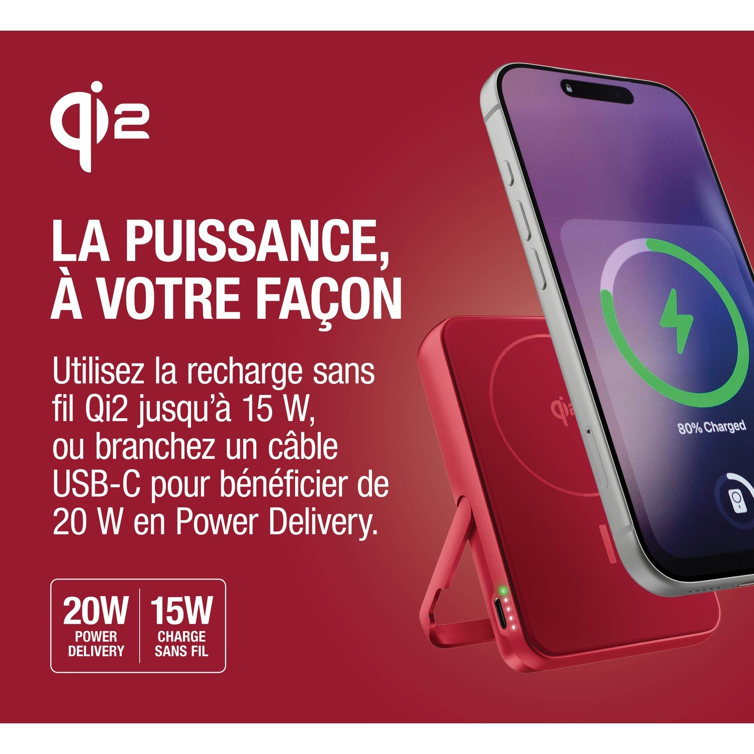 Un chargeur Qi2 rouge à côté d'un smartphone à 80% chargé.