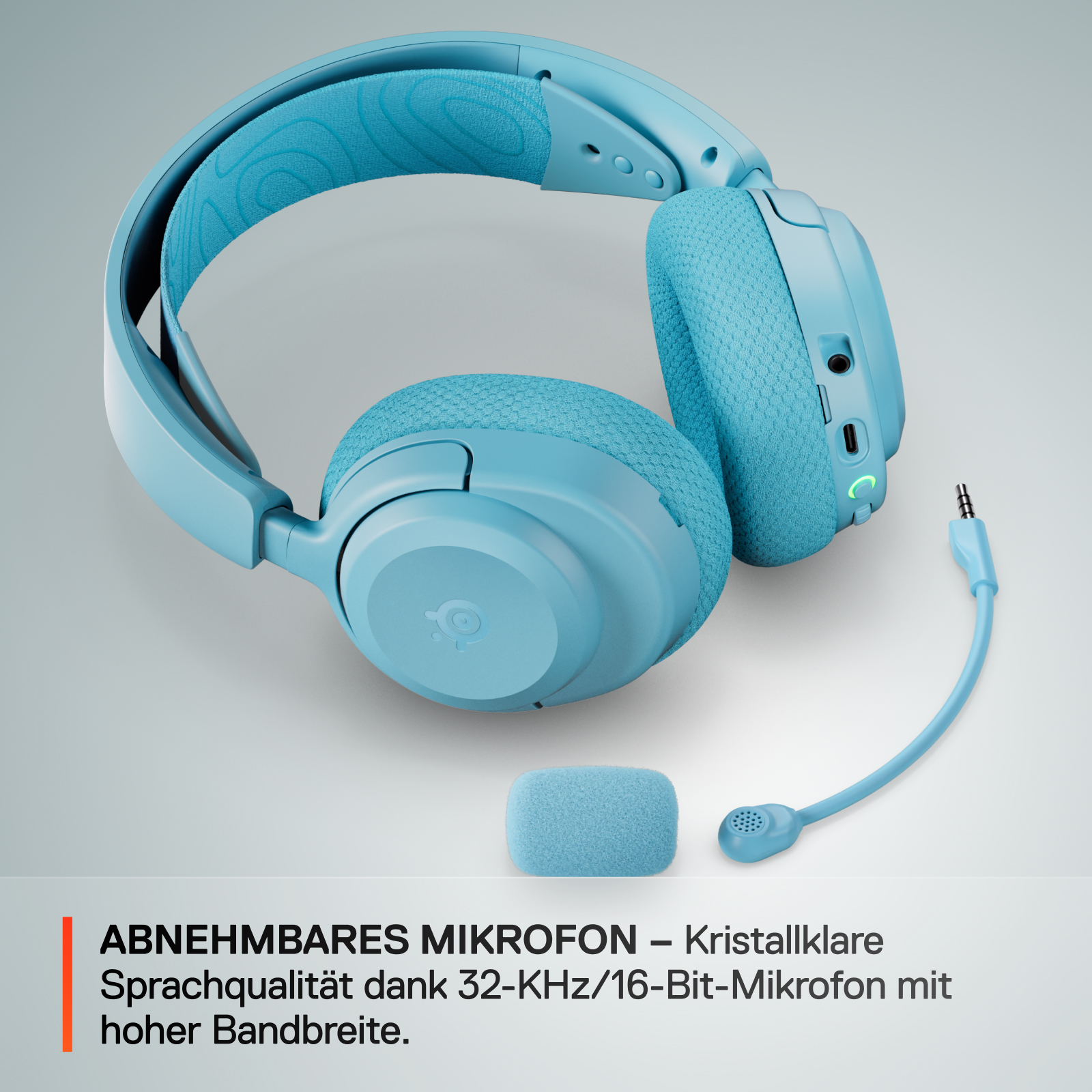 Blaue Kopfhörer mit abnehmbarem Mikrofon und Schaumstoffabdeckung.