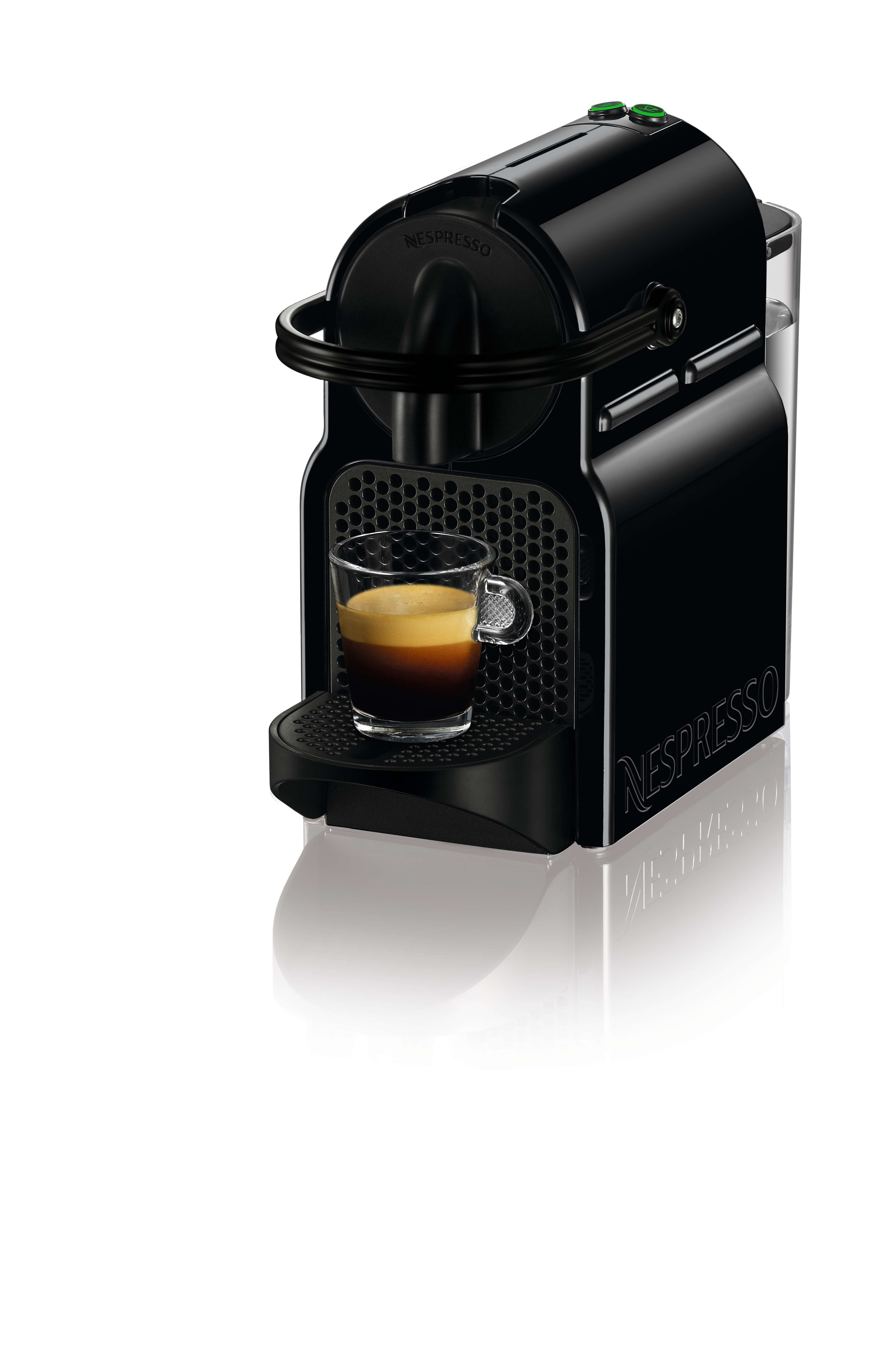 İki yeşil düğmeli, bir fincan espresso içeren siyah kahve makinesi.