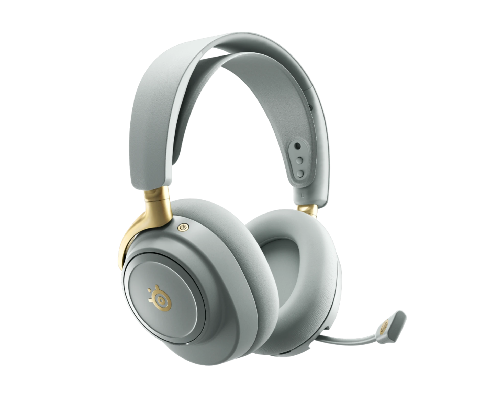 Auriculares grises con detalles dorados y micrófono sobre fondo negro.