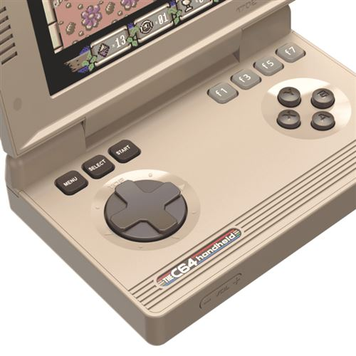 Un dispositivo portátil beige muestra un juego con íconos coloridos en su pantalla.