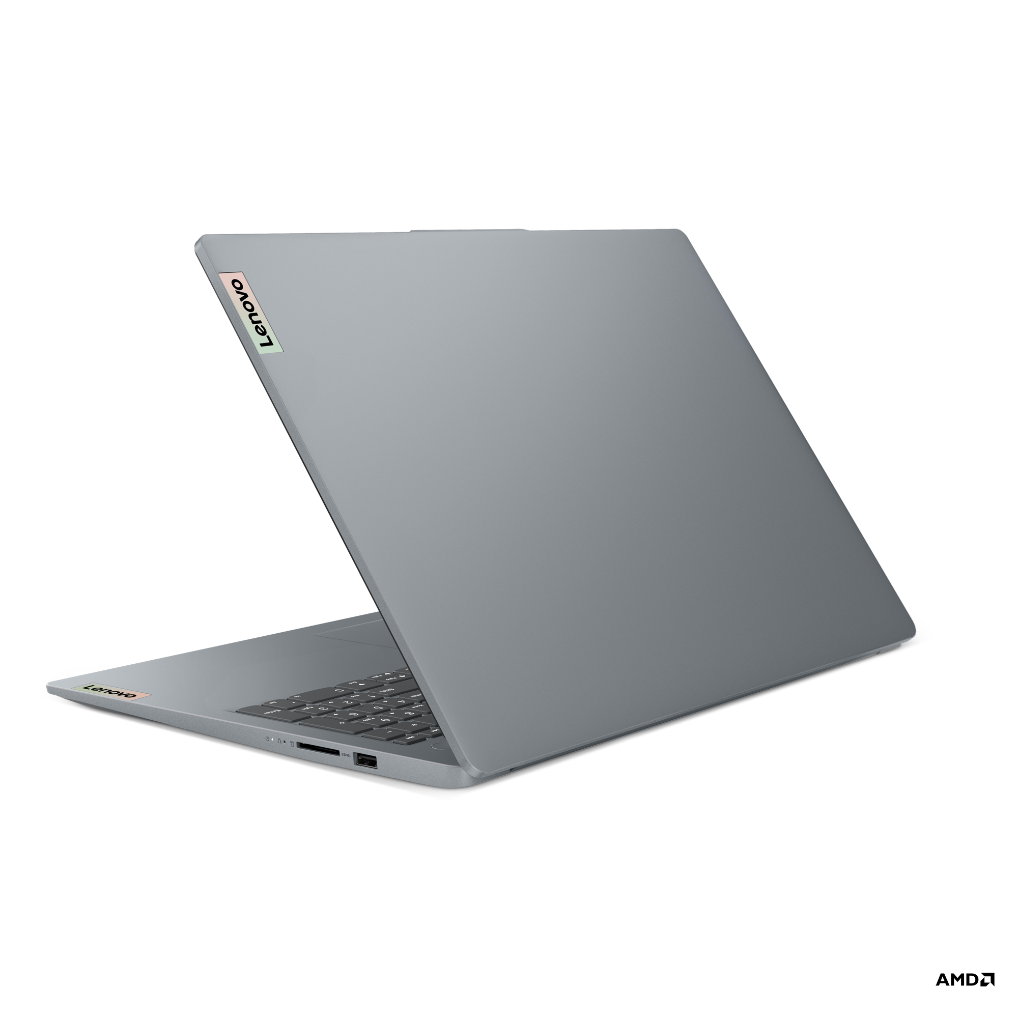 Gri Lenovo dizüstü bilgisayar, açık, klavye ve bağlantı noktaları görünüyor.