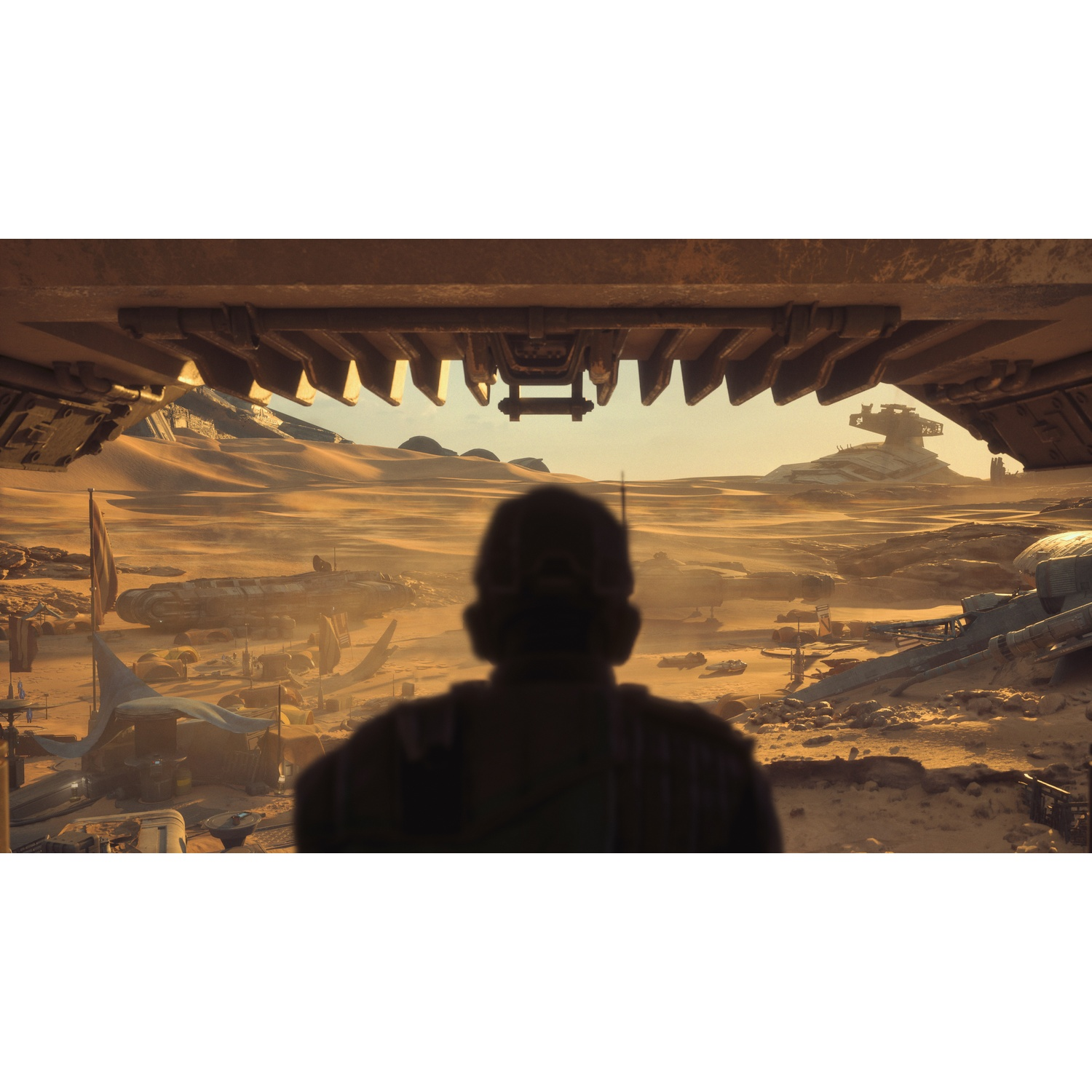 Silhouette d'une personne regardant un paysage désertique avec des épaves et structures.