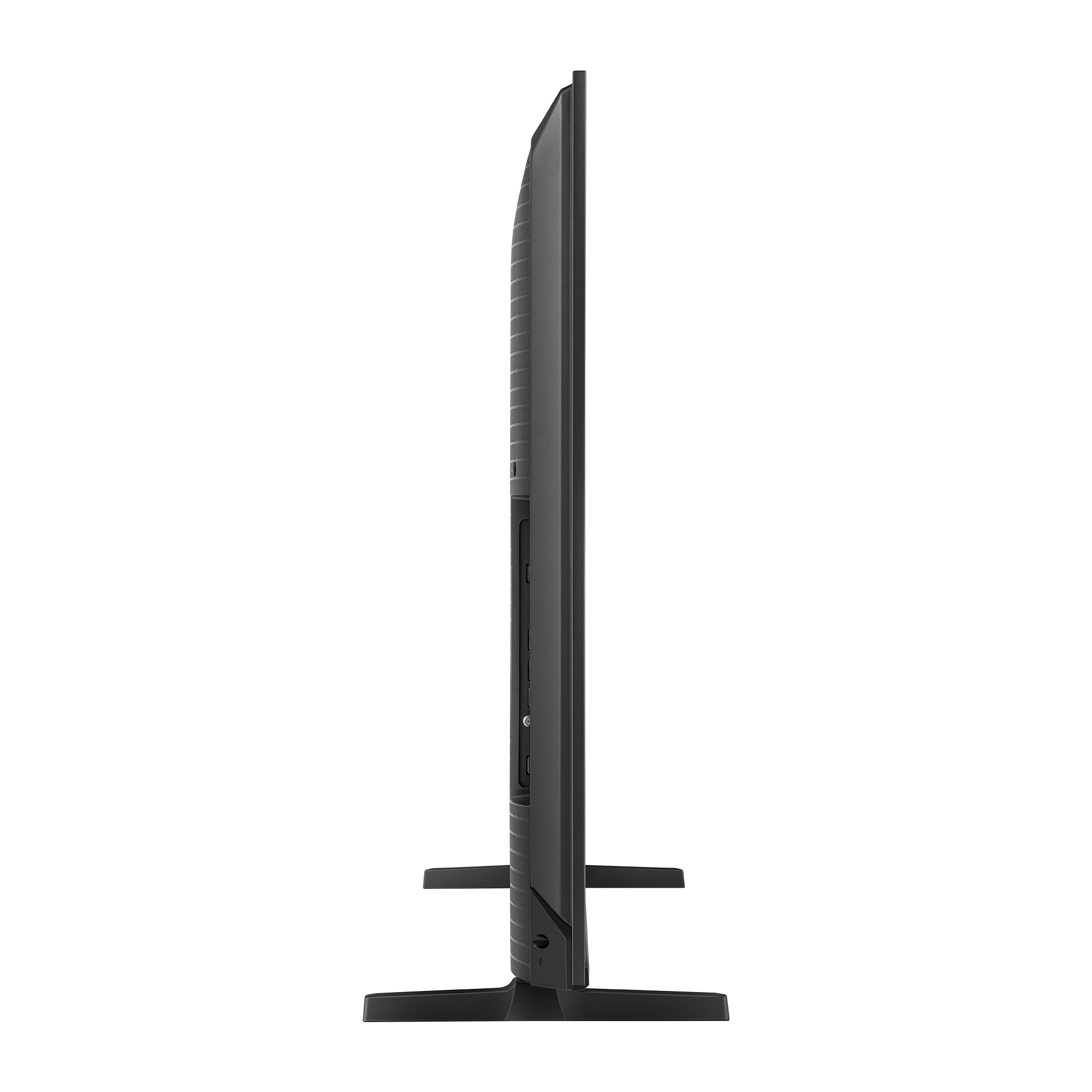 Un televisor negro con soporte, visto de lado.