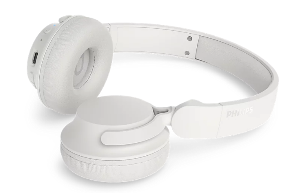 Białe słuchawki Philips z wyściełanymi nausznikami i regulowanym pałąkiem.