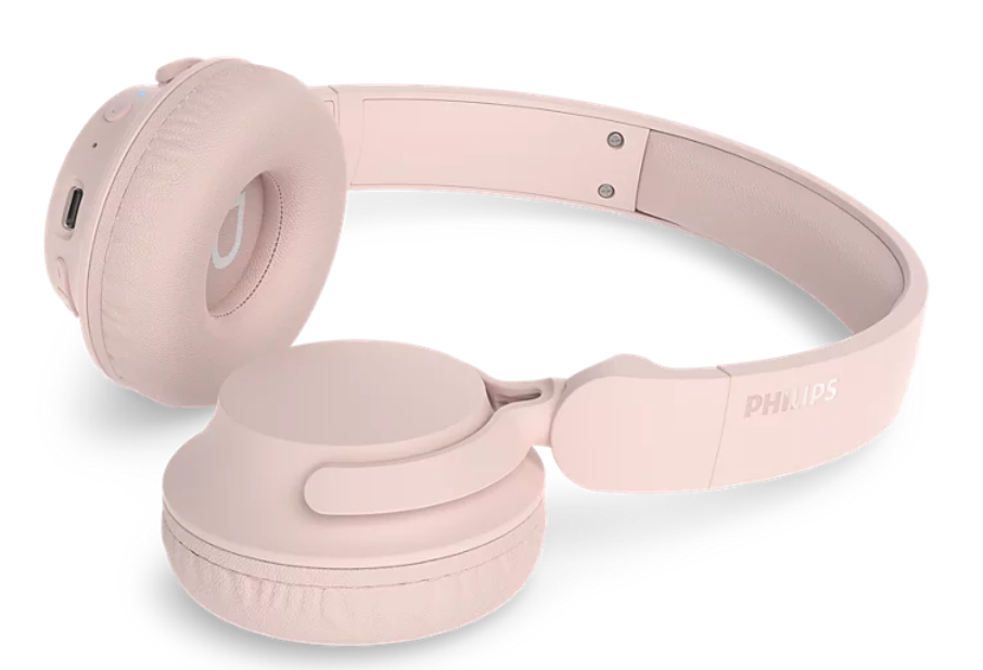 Różowe słuchawki Philips leżą na białym tle.