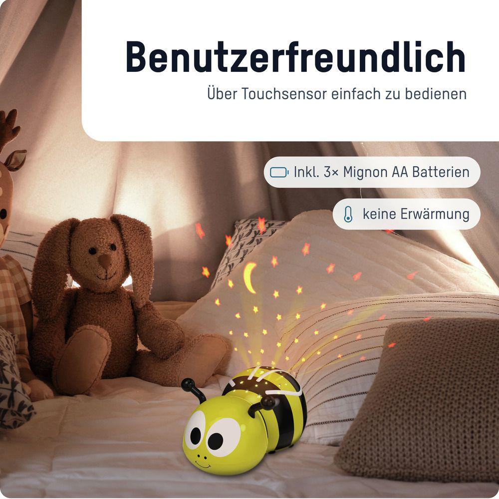Ein batteriebetriebener Bienenlichtprojektor wirft Sterne an die Wand.