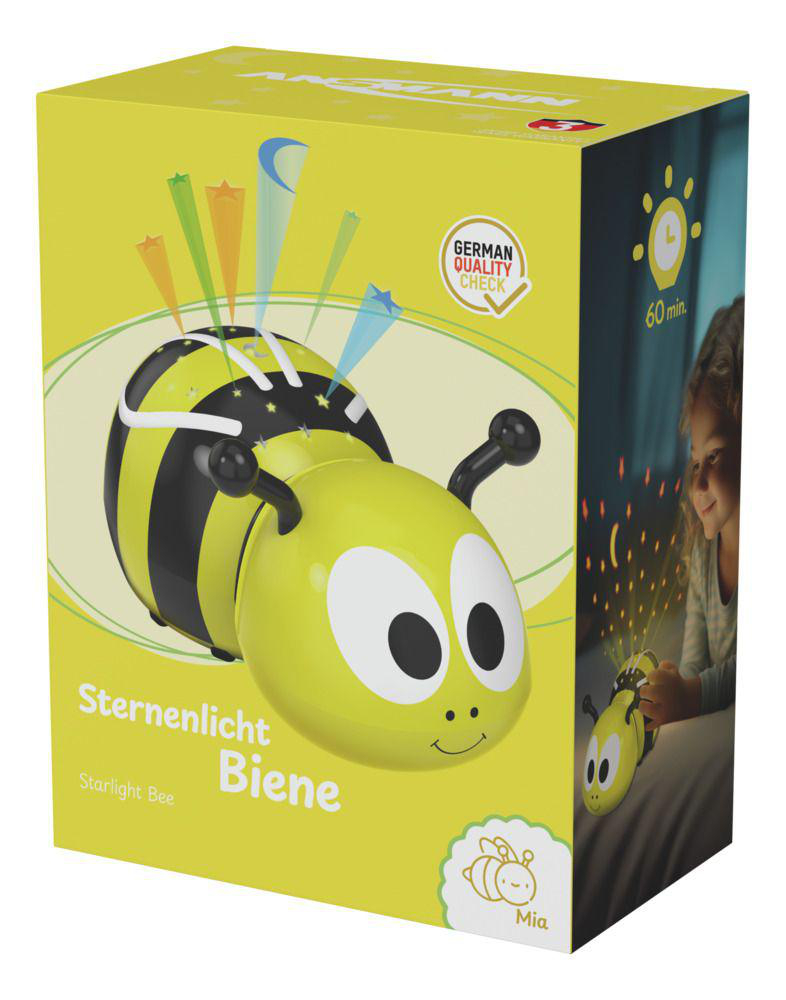 Verpackung eines gelben Bienen-Nachtlichts mit Sternen und einem Mädchen.
